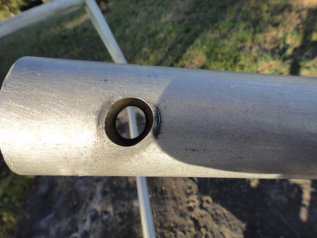 The oval holes in the boom